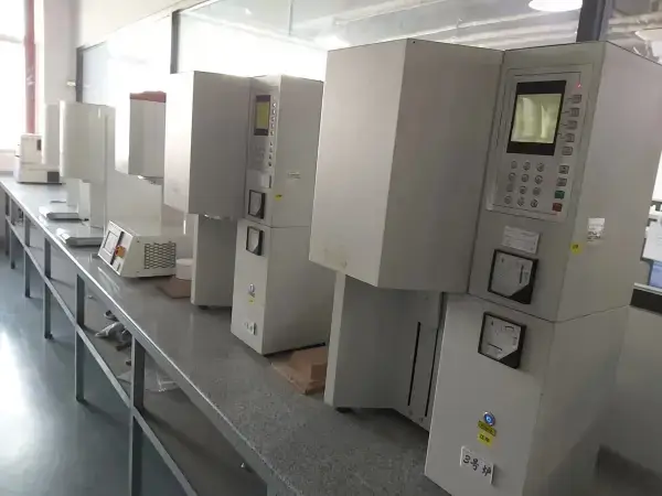 Row of dental laboratory machines in a clean production area