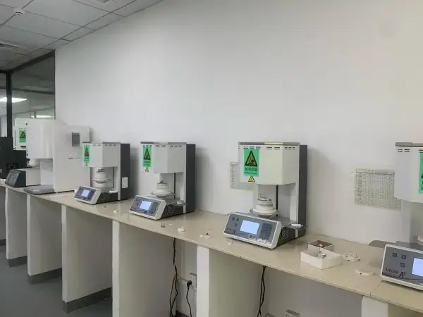 Clean dental lab workbench with equipment for restoration processing